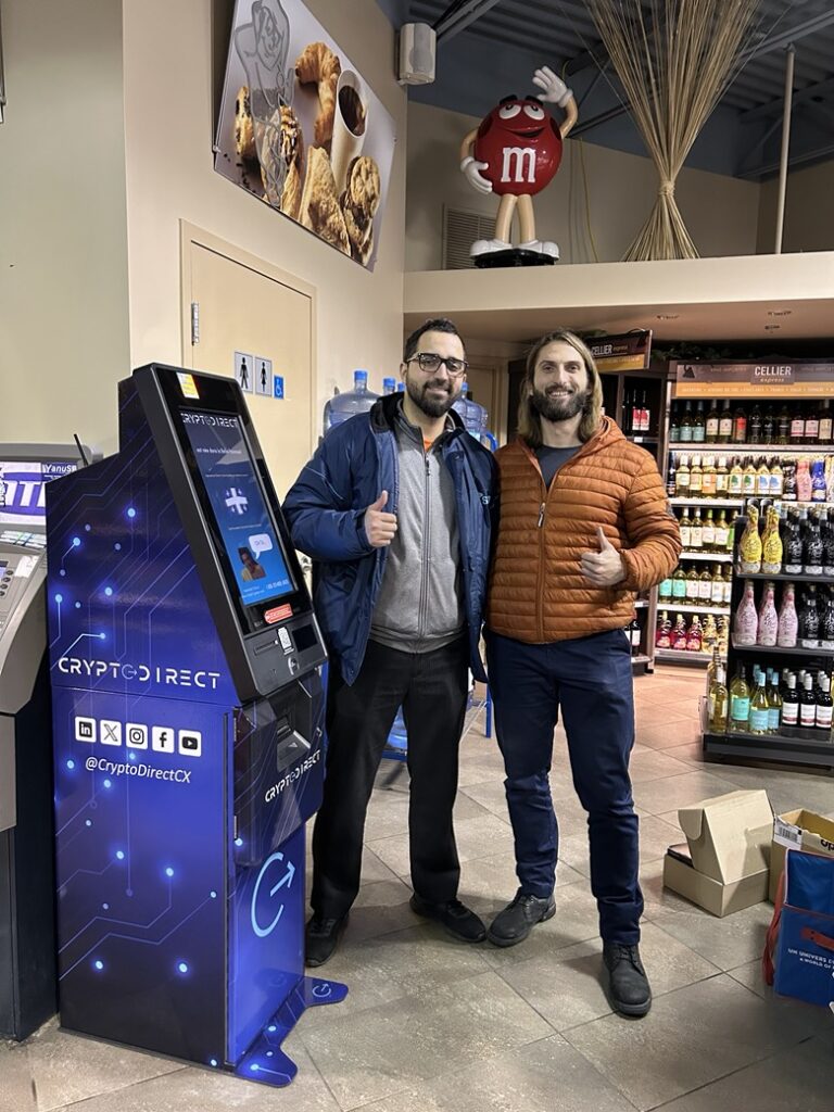 Founders of CryptoDirect standing next to the second BTM which launched in a 24/7 location in Brossard